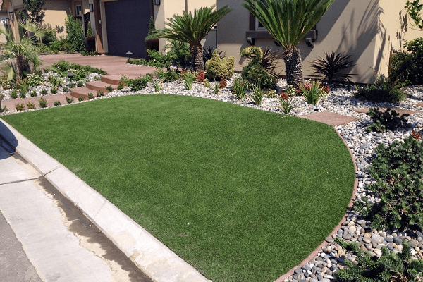Artificial grass installation at an Arizona home
